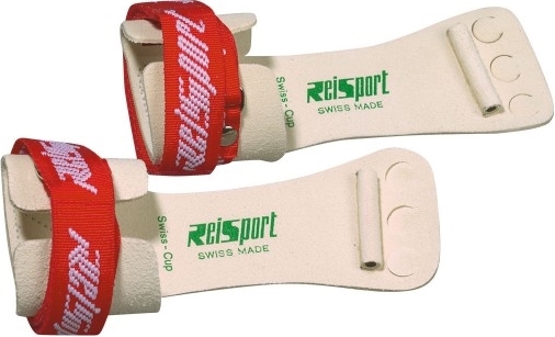 Ein Paar Turnriemchen von Reisport mit rotem Klettverschluss, Swiss Made, für das Turntraining.