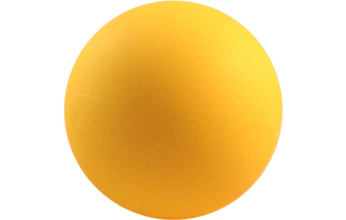 Ein gelber Gymnastikball, ideal für Fitnessübungen und Yoga-Training.