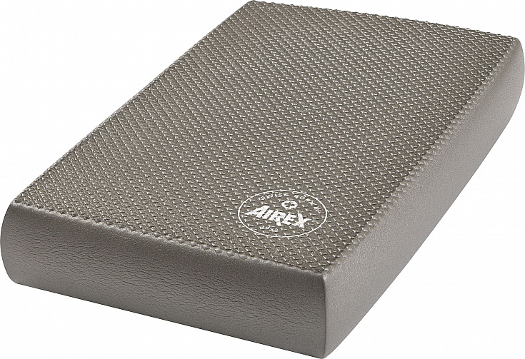 Graues AIREX Balance-Pad mit strukturierter Oberfläche, ideal für Gleichgewichtstraining und Physiotherapie