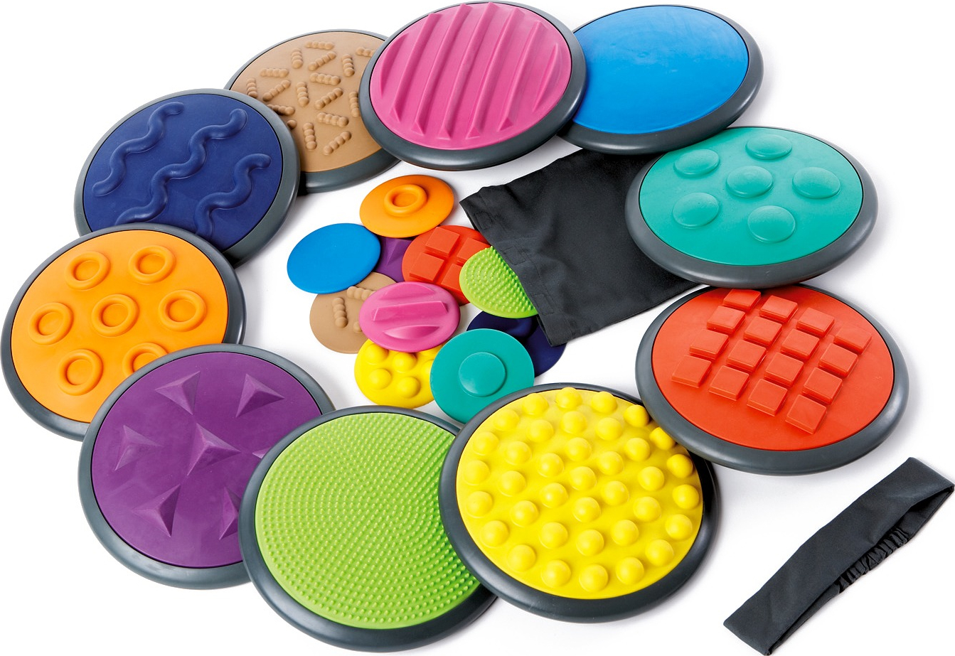 Farbenfrohe taktile Discs mit verschiedenen Oberflächenmustern, ideal für sensorische Entwicklung und spielerische Aktivitäten.